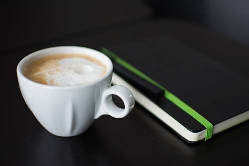 coffee cup white cup of coffee on black surface beverage
